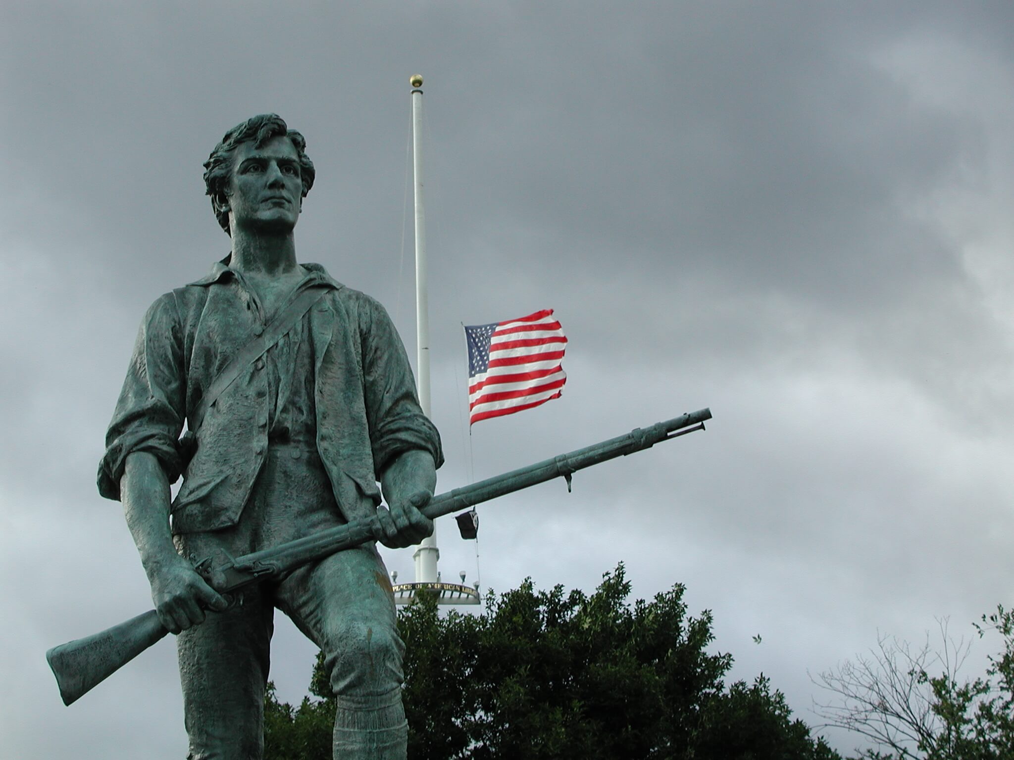 Minuteman sculpture by Henry Hudson Kitson stands in Minute Man National Historical Park in Massachusetts.